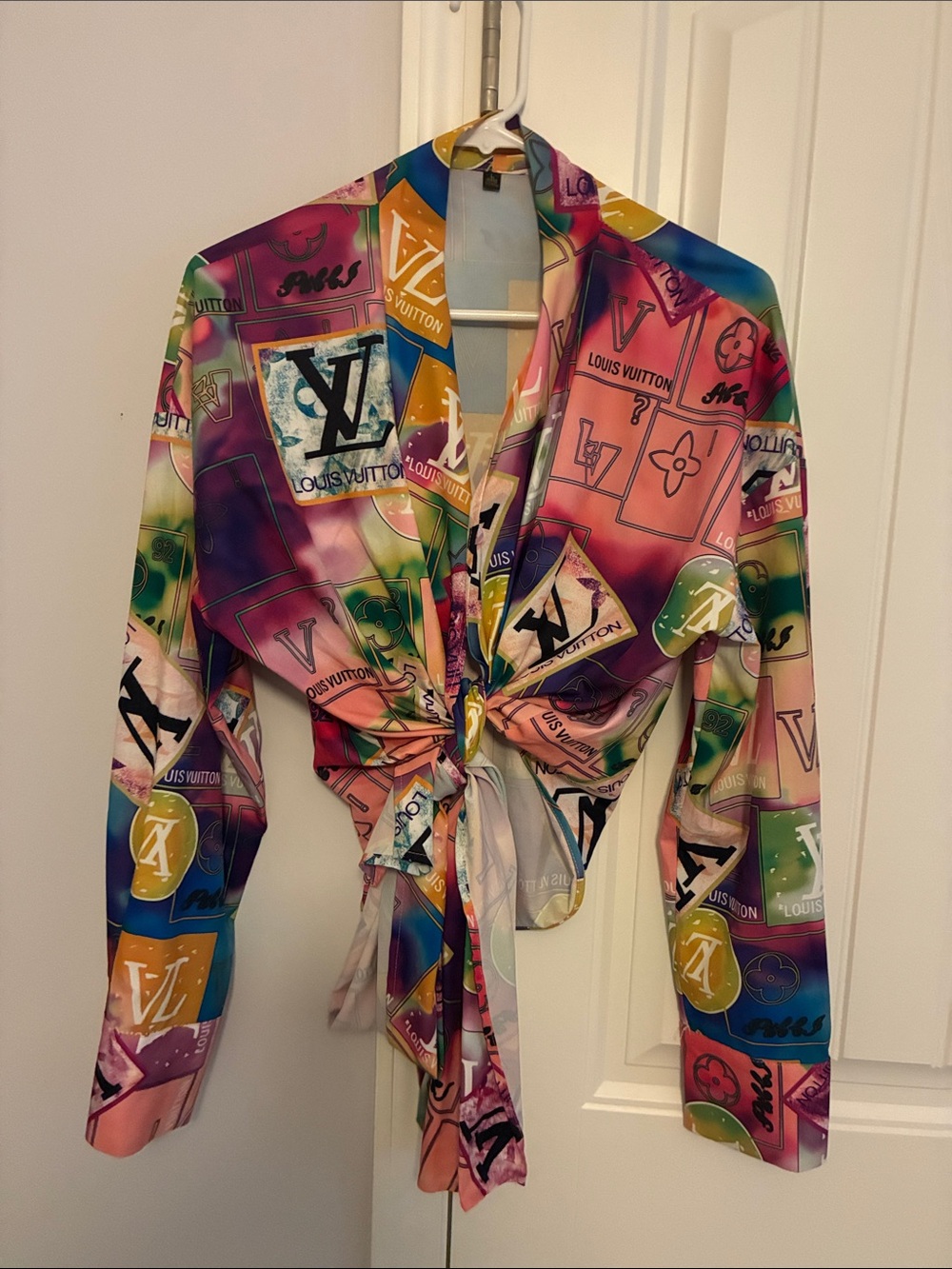Designer inspired. It is not a real Louis VItton top.  Multicolor Logo